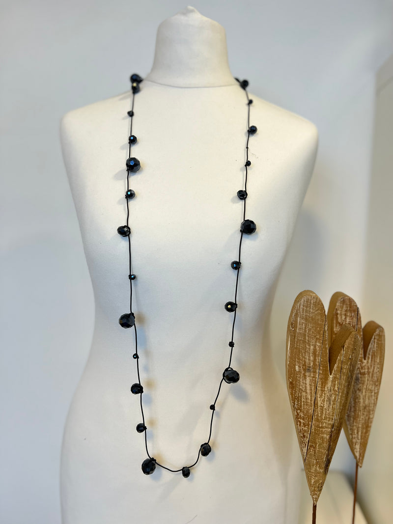 Crystal Faceted Beads on Rubber Necklace - Transparent Red