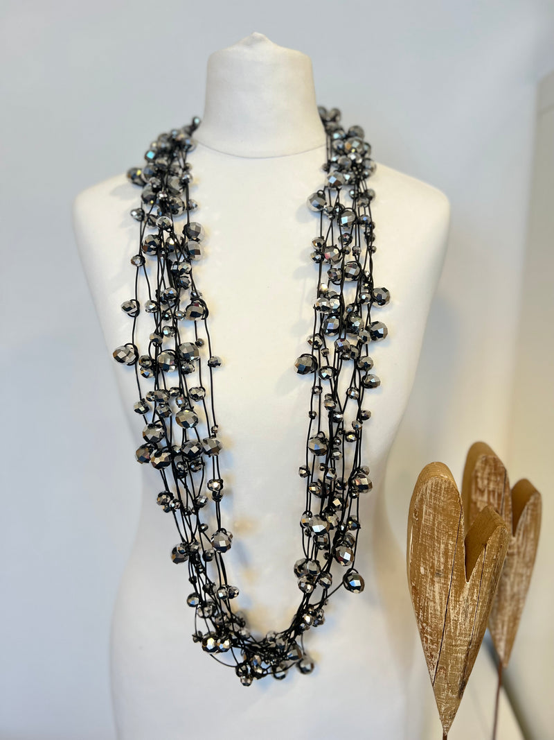 Crystal Faceted Beads on Rubber Necklace - Transparent Red