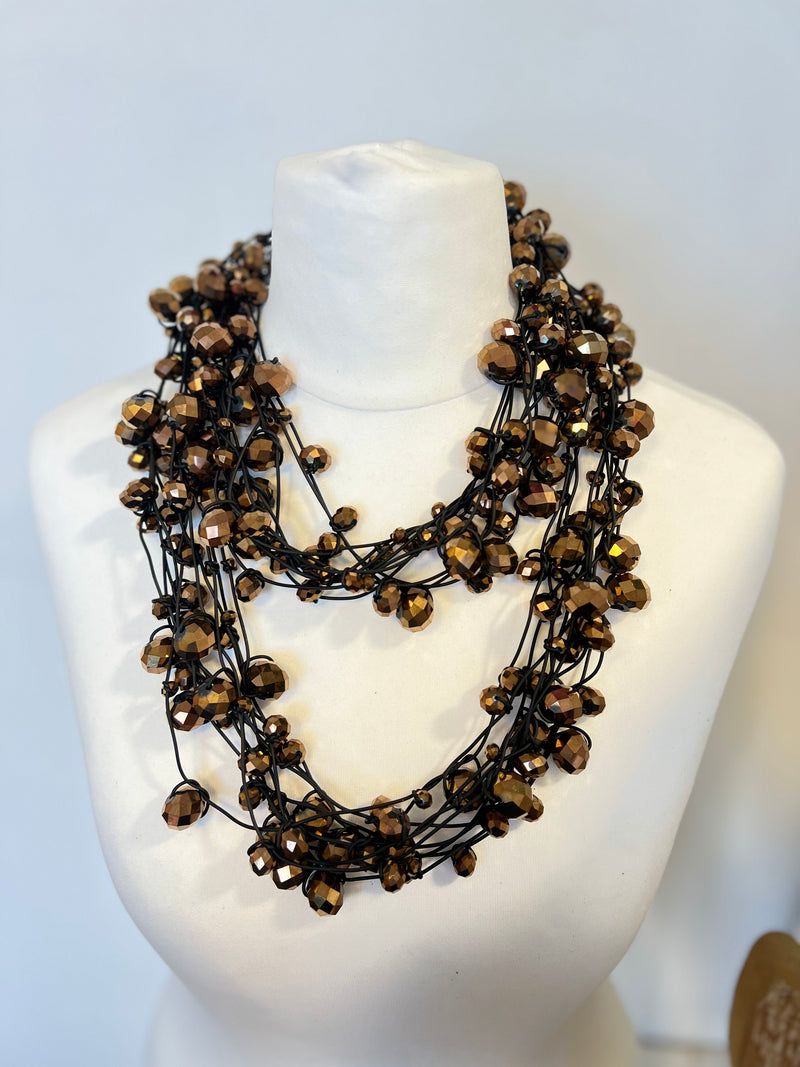 Crystal Faceted Beads on Rubber Necklace - Transparent Red
