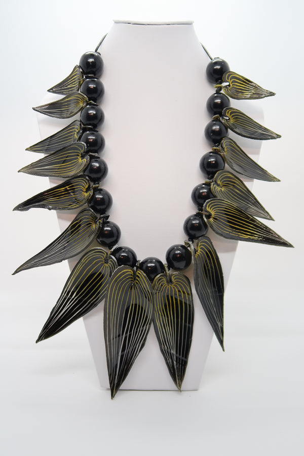 Recycled plastic bottles Bamboo leaves with beads necklace