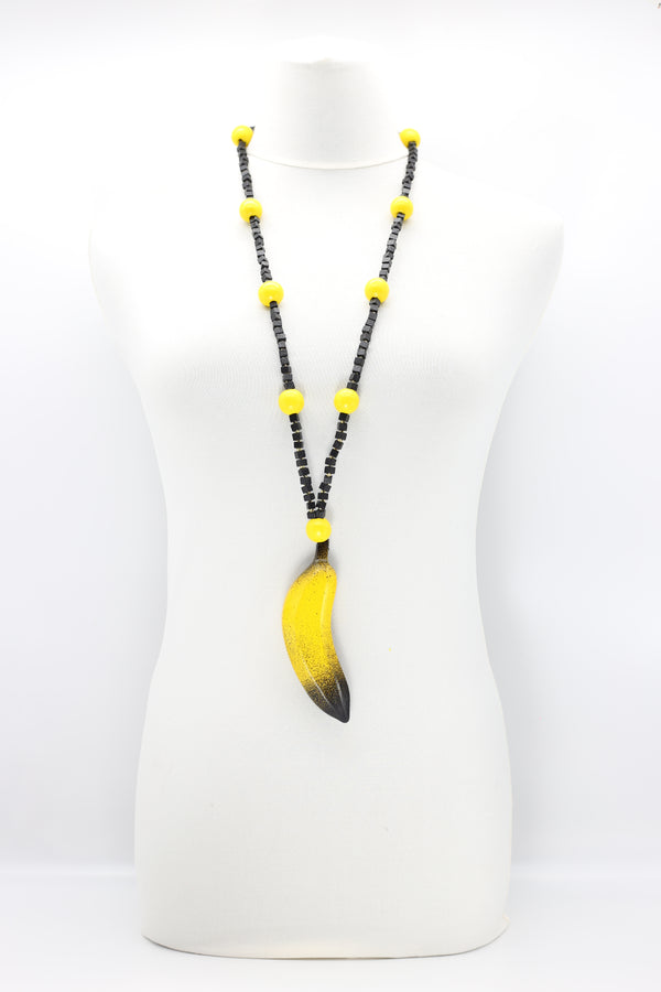 Hand Crafted Banana Pendant Necklace From Recycled Wood - Jianhui London
