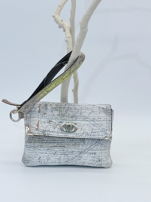 Handmade Recycled Leather Wristlet – Artistic Boho Bag with Newspaper Motif