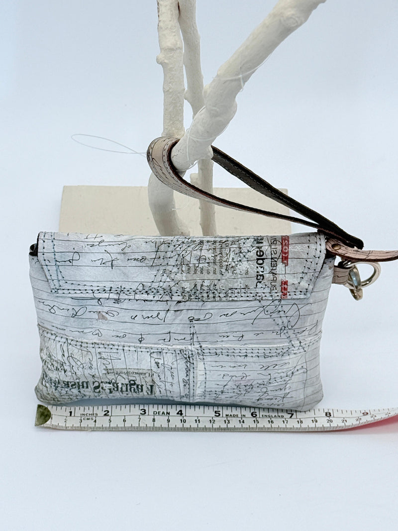 Handmade Recycled Leather Wristlet – Artistic Boho Bag with Newspaper Motif
