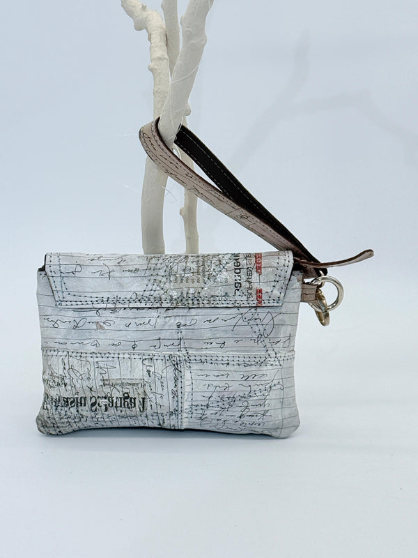 Handmade Recycled Leather Wristlet – Artistic Boho Bag with Newspaper Motif