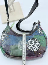 Hand Crafted recycled leather with recycled plastic hand bag